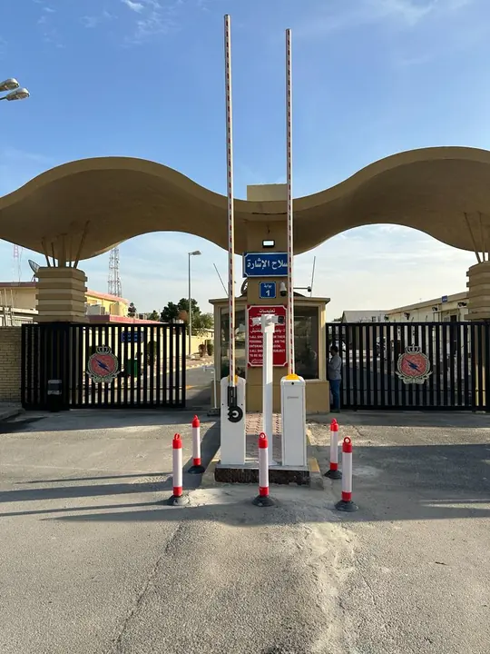 Ticket column and barriers at a site gate
