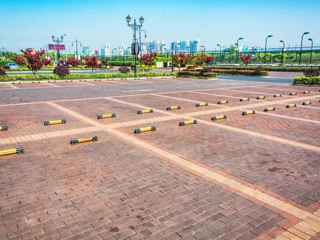 Open-air parking with wheel stops